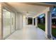 Spacious covered patio with ceiling fans and ample room for outdoor seating and entertaining at 1613 Shadow Rock Dr, Las Vegas, NV 89117