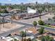 Aerial view of a neighborhood featuring a church with modern architecture and the Las Vegas skyline at 1700 E Oakey Blvd, Las Vegas, NV 89104