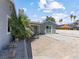 A backyard featuring patio, gravel, stone decor and a palm tree at 1700 E Oakey Blvd, Las Vegas, NV 89104