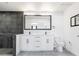 Modern bathroom featuring a dual sink vanity, sleek finishes, and a toilet at 1700 E Oakey Blvd, Las Vegas, NV 89104
