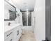 Updated bathroom featuring a shower, vanity and modern fixtures at 1700 E Oakey Blvd, Las Vegas, NV 89104