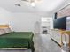 Bright bedroom featuring neutral decor, gray carpet, and walk-in closet, offering both comfort and ample storage at 1700 E Oakey Blvd, Las Vegas, NV 89104