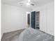 Bedroom featuring neutral carpet, an ensuite bathroom and a closet for storage at 1700 E Oakey Blvd, Las Vegas, NV 89104
