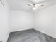 Clean bedroom featuring neutral carpet, white walls and a modern ceiling fan at 1700 E Oakey Blvd, Las Vegas, NV 89104