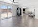 Bright living area with wood flooring and sliding glass doors that open to the backyard at 1700 E Oakey Blvd, Las Vegas, NV 89104