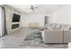 Bright living room featuring a gray sofa, marble fireplace, and modern design at 1700 E Oakey Blvd, Las Vegas, NV 89104