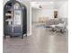 Bright living room with wood floors, modern furniture, and views into the backyard at 1700 E Oakey Blvd, Las Vegas, NV 89104