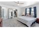 Spacious bedroom with walk-in closet, en suite bathroom, and soft carpet at 1700 E Oakey Blvd, Las Vegas, NV 89104