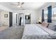 Spacious bedroom with walk-in closet, en suite bathroom, and soft carpet at 1700 E Oakey Blvd, Las Vegas, NV 89104