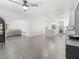 Spacious open floorplan with wood floors, a kitchen island, and modern decor at 1700 E Oakey Blvd, Las Vegas, NV 89104