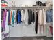 Organized walk-in closet with clothing racks, shelving, and shoe storage for optimal storage at 1700 E Oakey Blvd, Las Vegas, NV 89104