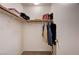 Walk-in closet includes built-in shelving and hanging space, perfect for organization and storage at 1902 Panther Pl, North Las Vegas, NV 89031