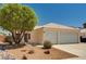 Charming single-story home with a well-maintained front yard and a spacious two-car garage at 1902 Panther Pl, North Las Vegas, NV 89031