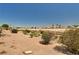 Neighborhood view featuring desert landscaping and walking trails, complete with picturesque mountain views in the distance at 1902 Panther Pl, North Las Vegas, NV 89031
