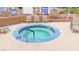 Community hot tub with tile trim and seating at 2040 Mesquite Ln # 203, Laughlin, NV 89029