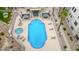 An aerial view of the community pool and hot tub with lounge chairs at 2040 Mesquite Ln # 203, Laughlin, NV 89029