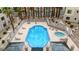 An aerial view of the community pool and hot tub with lounge chairs at 2040 Mesquite Ln # 203, Laughlin, NV 89029