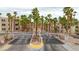 Gated entrance with lush palm trees creating a welcoming atmosphere to the condo community at 2040 Mesquite Ln # 203, Laughlin, NV 89029