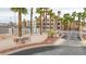 Portofino Condominiums entrance sign surrounded by palm trees at 2040 Mesquite Ln # 203, Laughlin, NV 89029