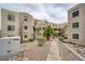 Attractive condo building with palm trees and well-kept landscaping at 2040 Mesquite Ln # 203, Laughlin, NV 89029