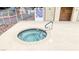 Inviting outdoor hot tub with tile accents and safety railing at 2040 Mesquite Ln # 203, Laughlin, NV 89029