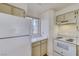 Bright kitchen with essential appliances, including a refrigerator and stove at 2040 Mesquite Ln # 203, Laughlin, NV 89029