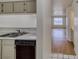 The kitchen provides a pass through view to the living area at 2040 Mesquite Ln # 203, Laughlin, NV 89029