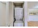 Convenient laundry area with a stacked washer and dryer unit at 2040 Mesquite Ln # 203, Laughlin, NV 89029