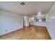 Open-concept living room with wood floors flowing into the kitchen area at 2040 Mesquite Ln # 203, Laughlin, NV 89029