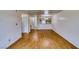 A well-lit living area with wood flooring that flows into a connected kitchen space at 2040 Mesquite Ln # 203, Laughlin, NV 89029