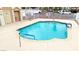 Community pool with inviting blue water and easy-access handrails at 2040 Mesquite Ln # 203, Laughlin, NV 89029