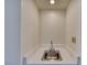 Convenient wet bar area with stainless steel sink and neutral decor at 2040 Mesquite Ln # 203, Laughlin, NV 89029