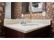 Bathroom features vanity with marble countertop and undermount sink at 2050 W Warm Springs Rd # 4322, Henderson, NV 89014