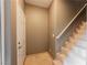 Entryway showcases stairs with tile flooring and neutral walls leading to the upper level at 2050 W Warm Springs Rd # 4322, Henderson, NV 89014