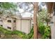 A view from above reveals a well-maintained building and lush landscaping surrounding the property at 2050 W Warm Springs Rd # 4322, Henderson, NV 89014