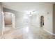 Neutral living area with tiled floors and arched entryways at 2050 W Warm Springs Rd # 4322, Henderson, NV 89014