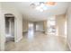 Open-concept living area with ceiling fan and tile flooring throughout the space at 2050 W Warm Springs Rd # 4322, Henderson, NV 89014
