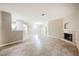 Open-plan living room showcasing the fireplace and connecting rooms at 2050 W Warm Springs Rd # 4322, Henderson, NV 89014