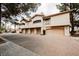 A row of garages in a complex, offering ample parking space, set in a clean paved environment at 2050 W Warm Springs Rd # 4322, Henderson, NV 89014
