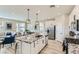 Stylish kitchen featuring granite countertops, stainless steel appliances, and an island with seating at 2417 Fasano St, Henderson, NV 89044