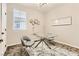 This bright home office has carpet and neutral colors, ready for new tenants at 2417 Fasano St, Henderson, NV 89044