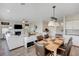 Open floorplan from the living room to the dining area and kitchen at 2440 Ping Dr, Henderson, NV 89074