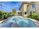 A beautiful backyard with a pool and spa, perfect for outdoor entertaining at 2440 Ping Dr, Henderson, NV 89074