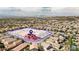 Aerial view of a neighborhood with mountains, the Las Vegas Strip, and the Raiders Stadium in the distance at 2529 Flodden St, Henderson, NV 89044