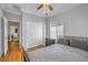 Bedroom with hardwood floors, closet, natural light, and neutral tones at 2529 Flodden St, Henderson, NV 89044