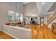 Open-concept living space with high ceilings and hardwood floors at 2529 Flodden St, Henderson, NV 89044