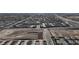 Extensive aerial view of a large residential neighborhood showcasing the community's layout and surrounding environment at 2598 Polar White Ave, North Las Vegas, NV 89086