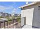 A view of a balcony overlooking the community and surrounding homes at 2598 Polar White Ave, North Las Vegas, NV 89086