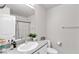 Bathroom features a granite countertop vanity, framed mirror, and essential fixtures at 2598 Polar White Ave, North Las Vegas, NV 89086