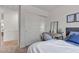 Bedroom with desk, closet, and decor, creating a cozy and organized space at 2598 Polar White Ave, North Las Vegas, NV 89086